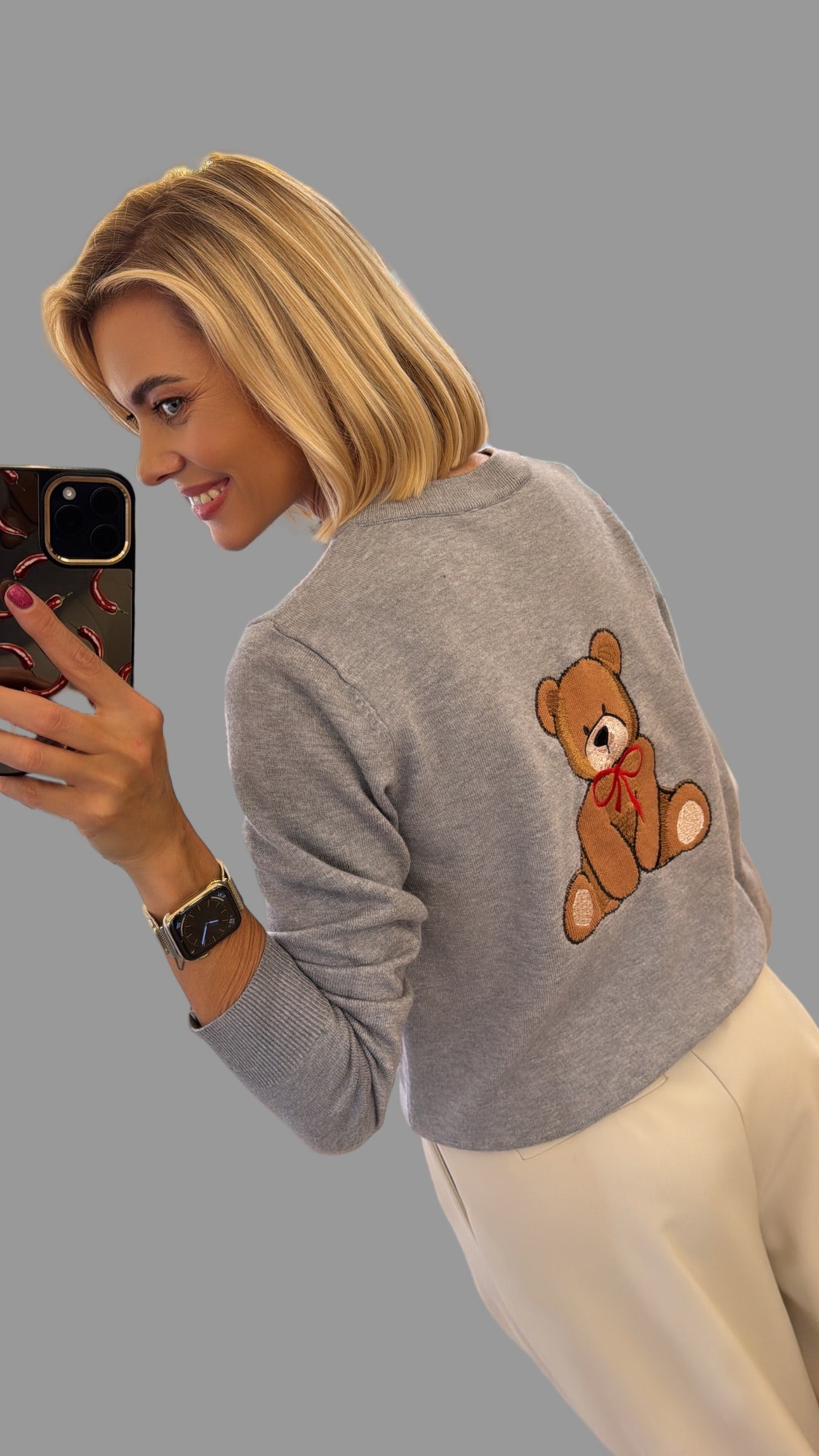 Megztinis su sagutėmis