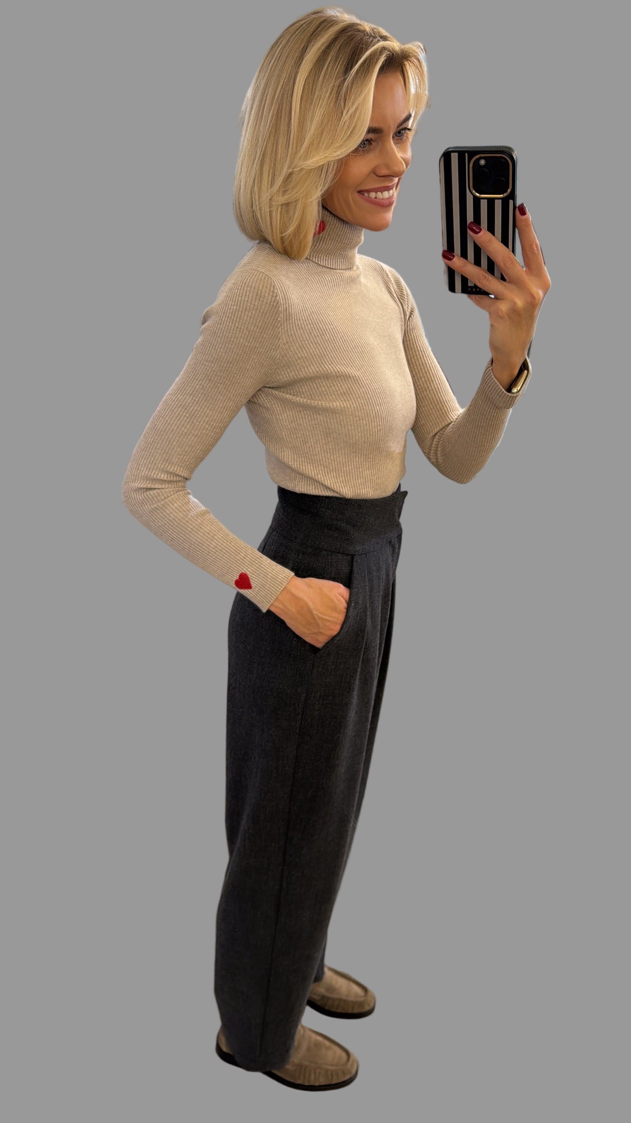 Kelnės aukštu liemeniu