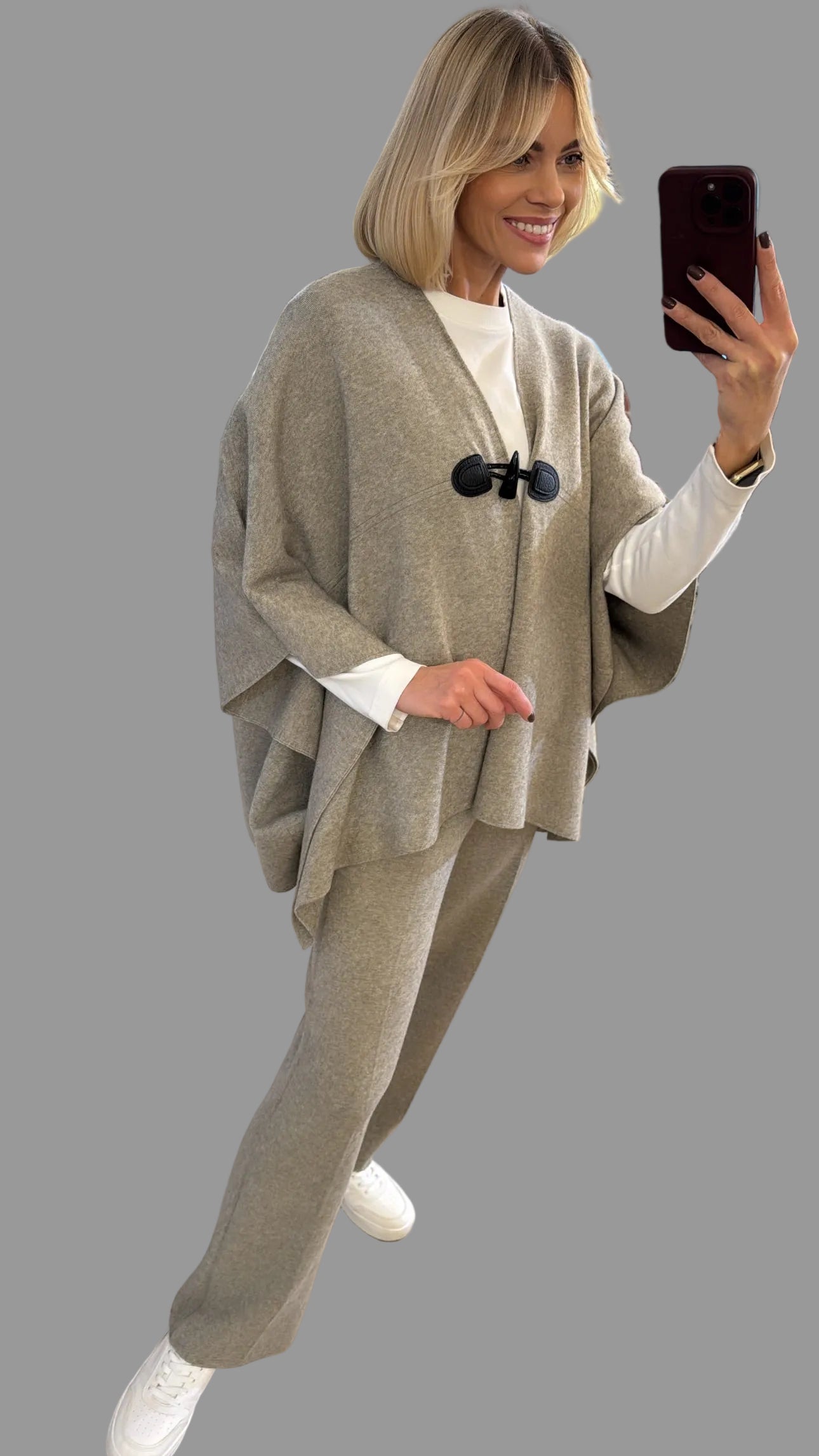 Kostiumas su pelerina