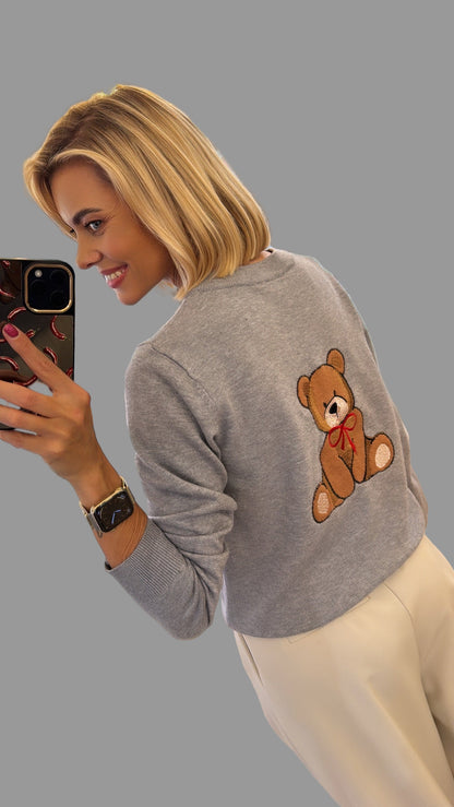 Megztinis su sagutėmis